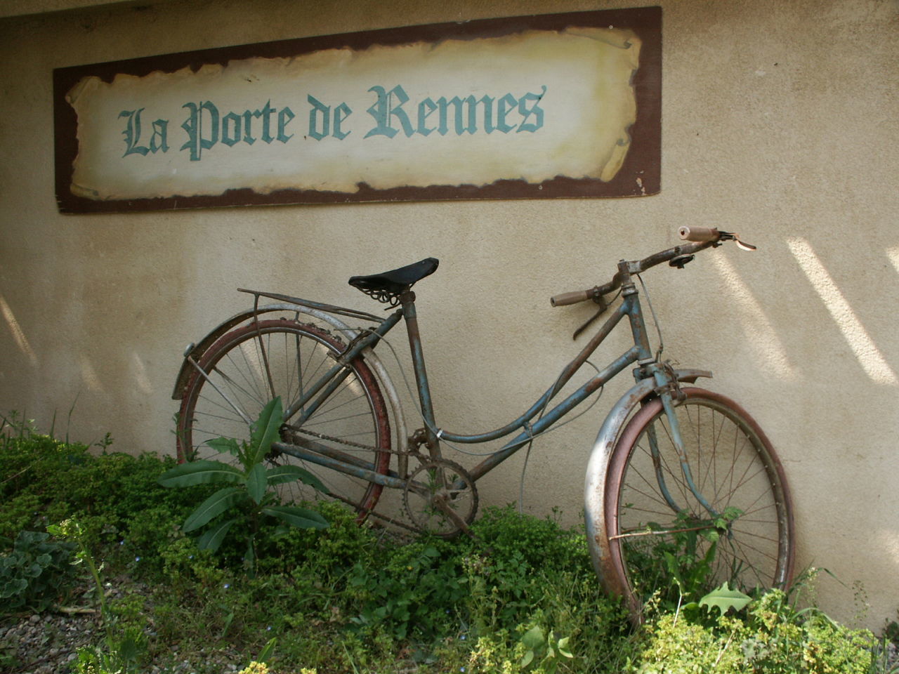 PARKED BICYCLES PARKED AT ROADSIDE