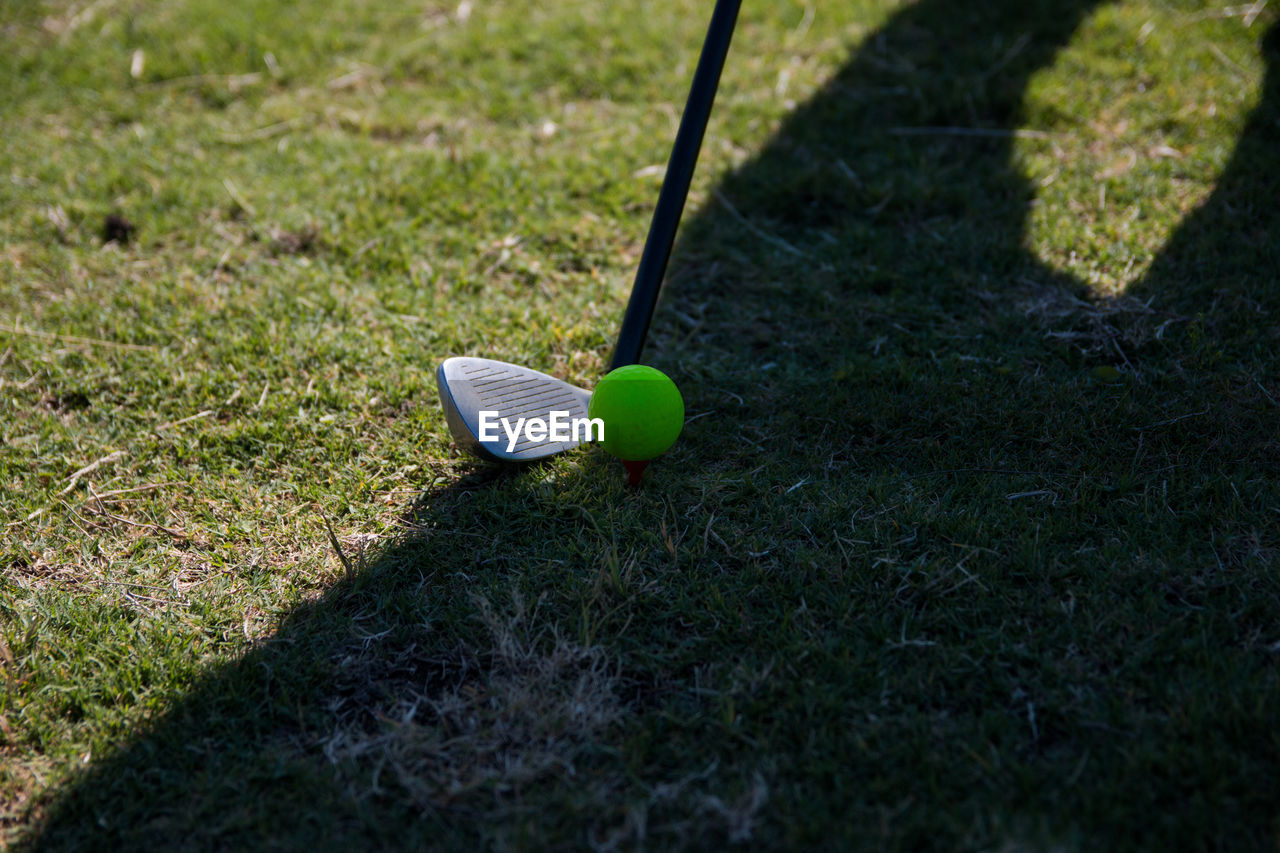 Green ball on golf field