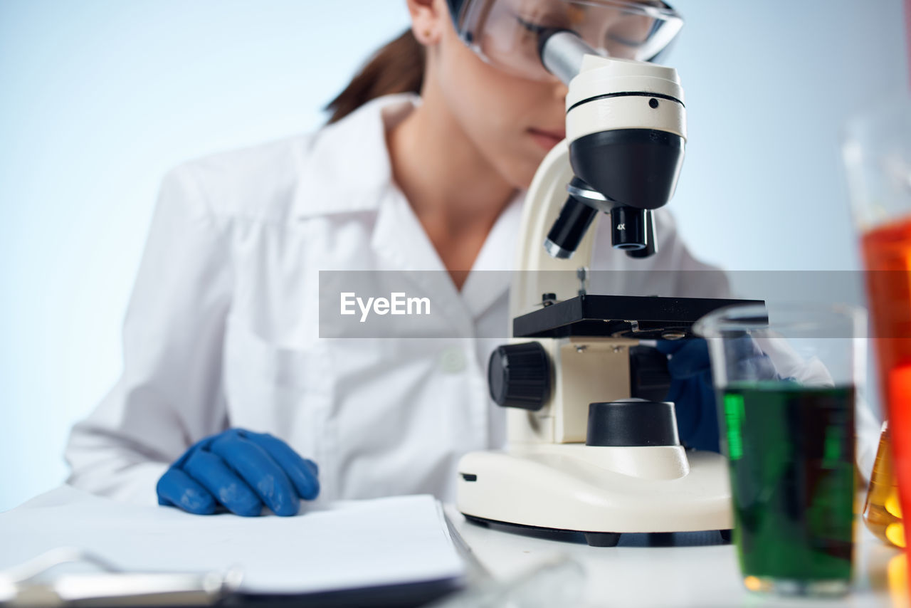 female scientist working on table