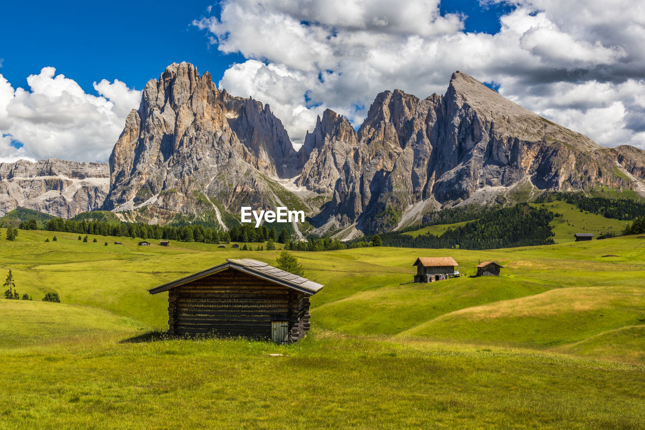 Scenic view of landscape and mountains against sky