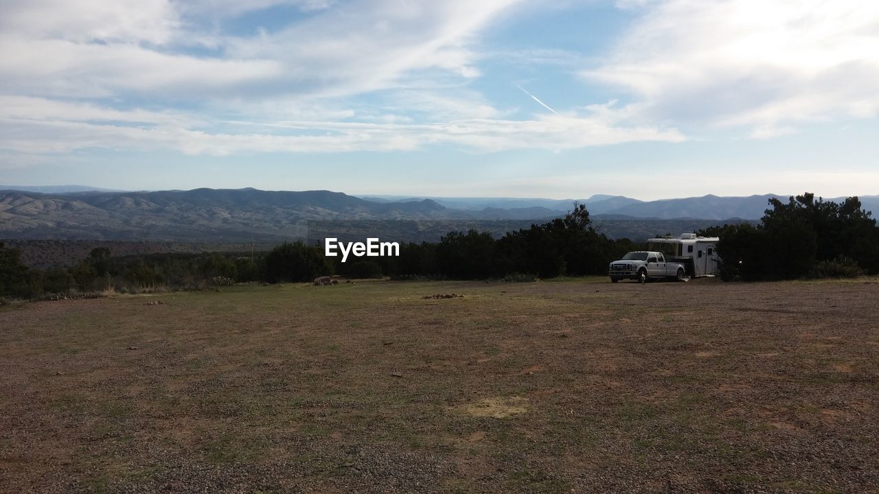 sky, cloud - sky, no people, transportation, field, day, land vehicle, nature, landscape, outdoors, mountain, scenics, tree