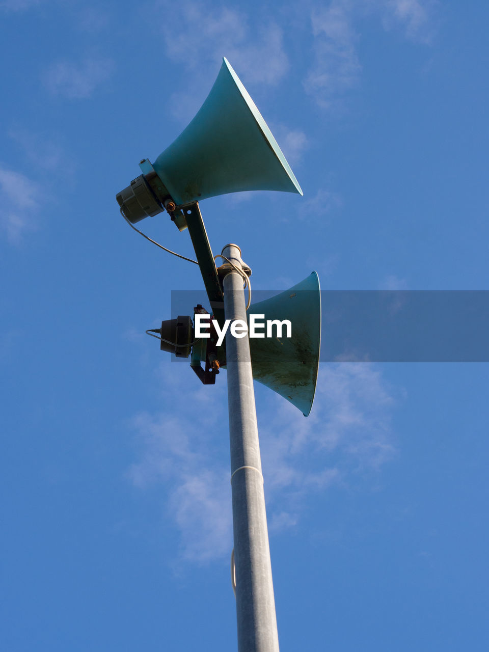 Loud speakers on a metal pole