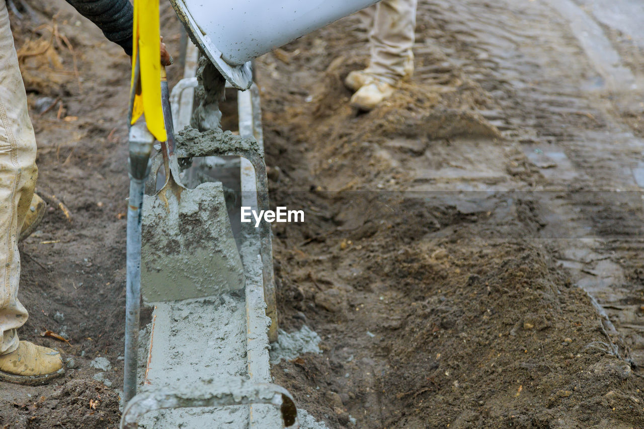 VIEW OF CONSTRUCTION SITE IN FRONT OF WATER