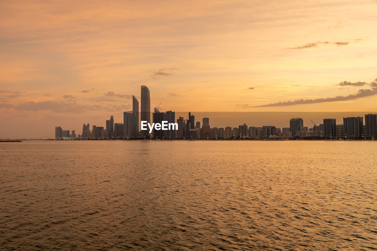 Abu dhabi skyline at the sunrise