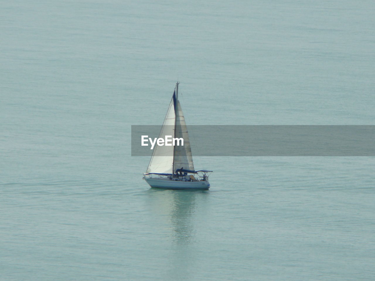 Sailboat sailing on sea