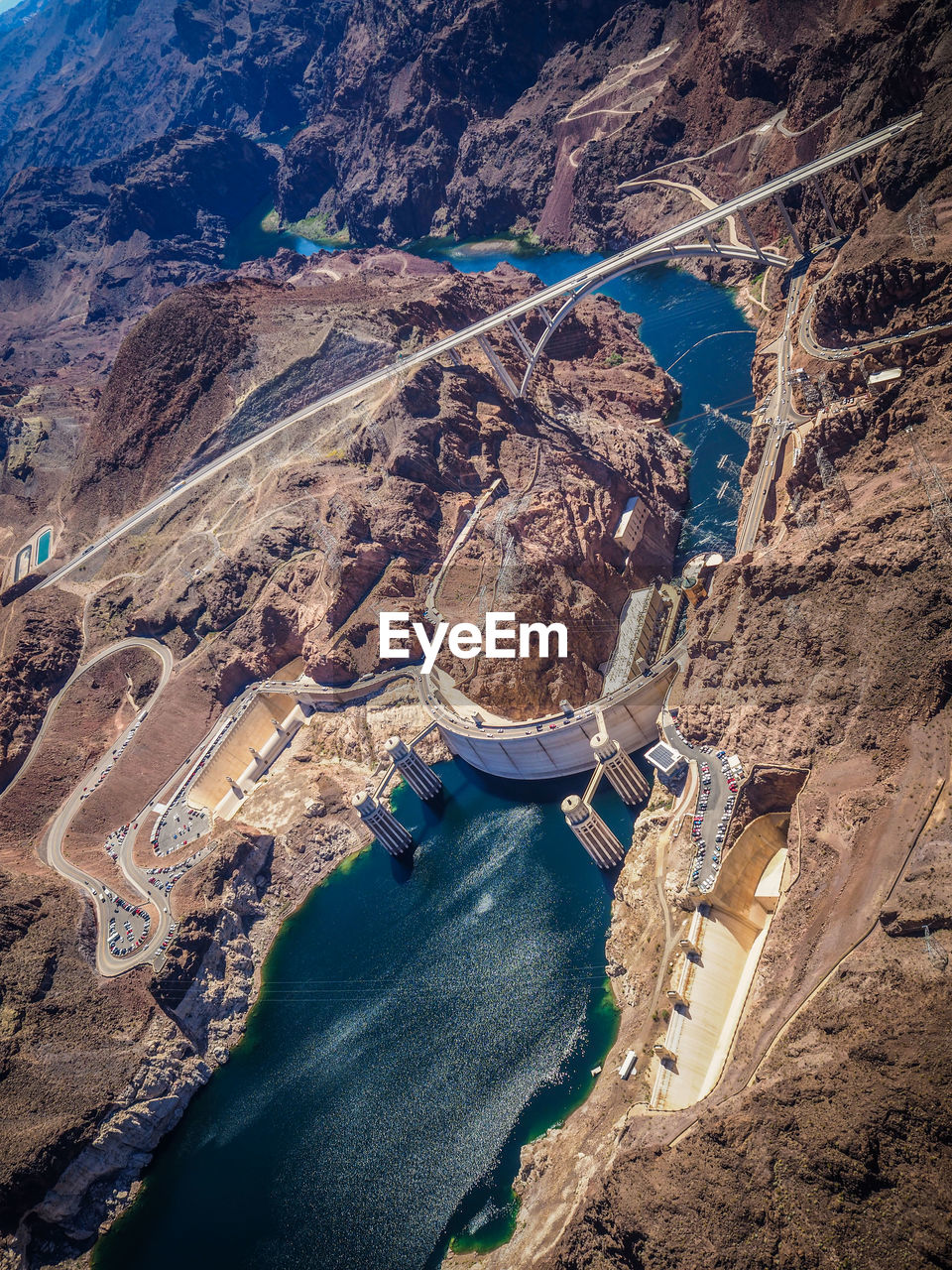 High angle shot of lake along rocky landscape