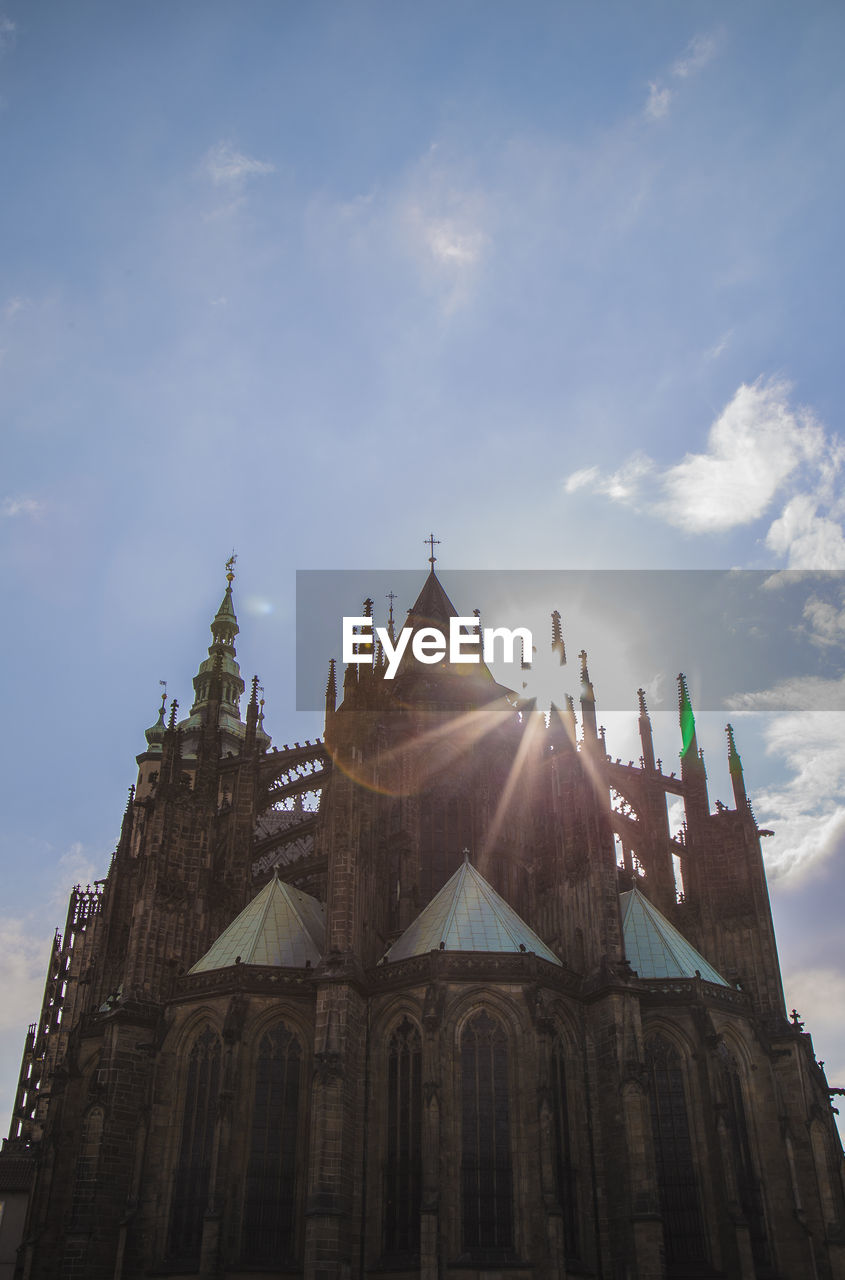 Low angle view of prague castle against bright sky