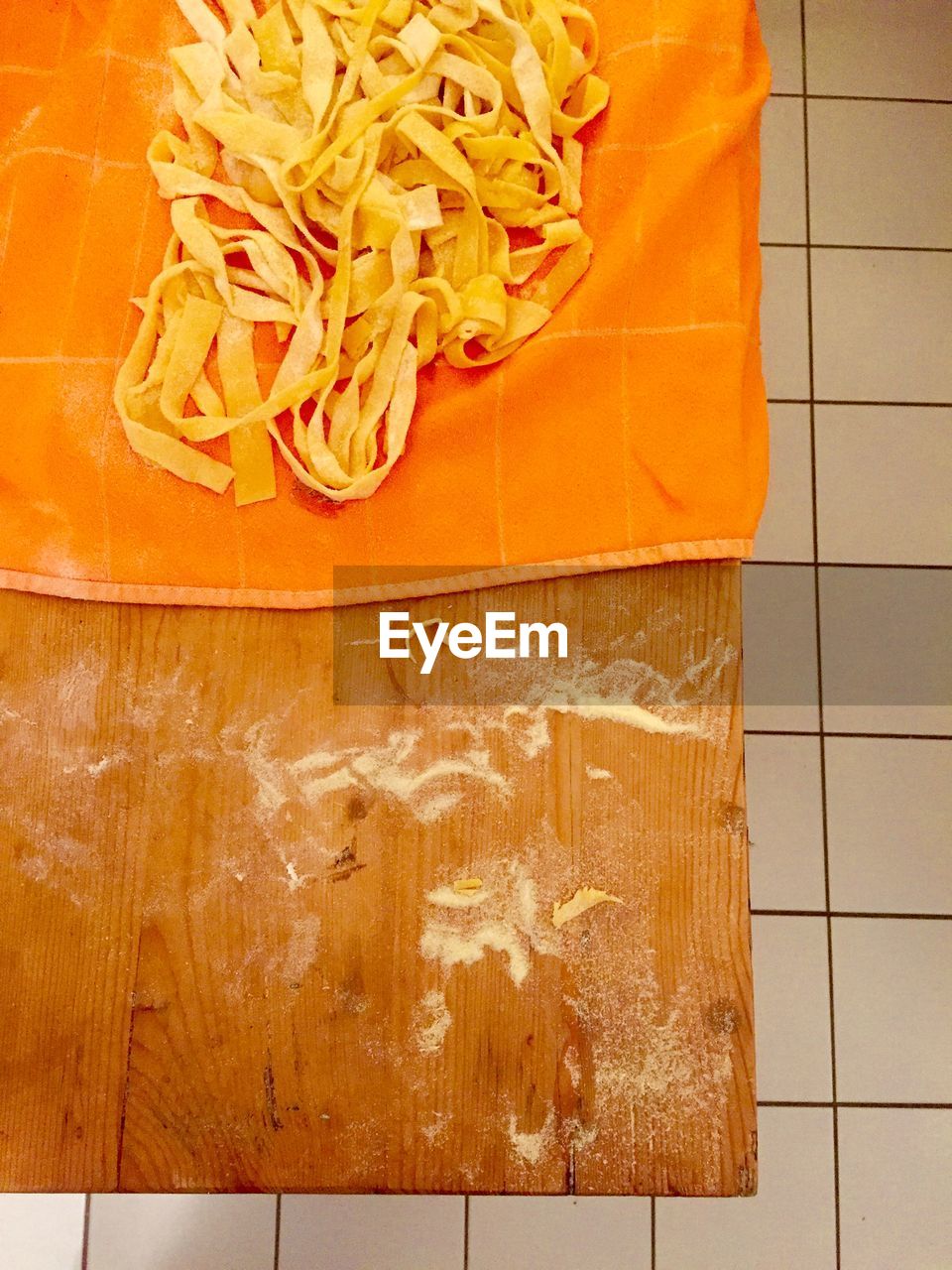 Raw pasta on cutting board