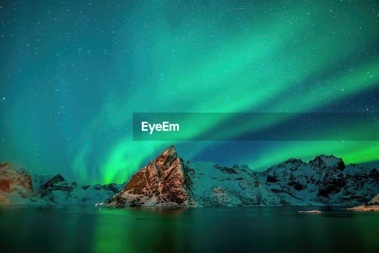 scenic view of sea against clear sky at night