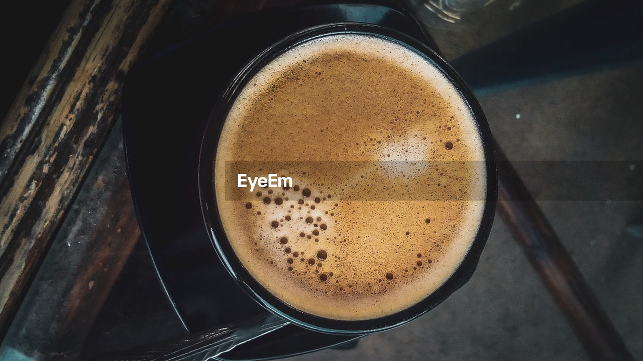 CLOSE-UP OF COFFEE ON TABLE