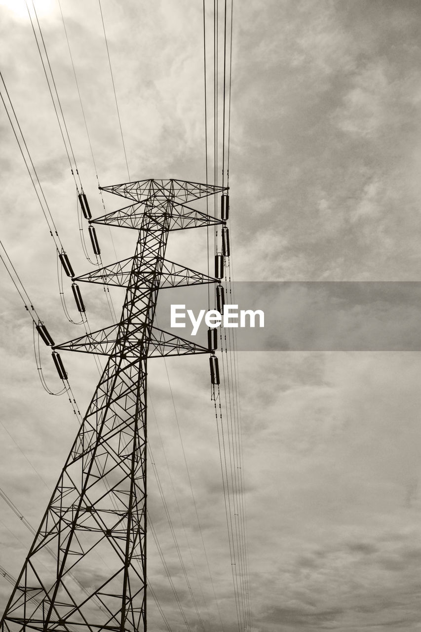 LOW ANGLE VIEW OF ELECTRICITY PYLON