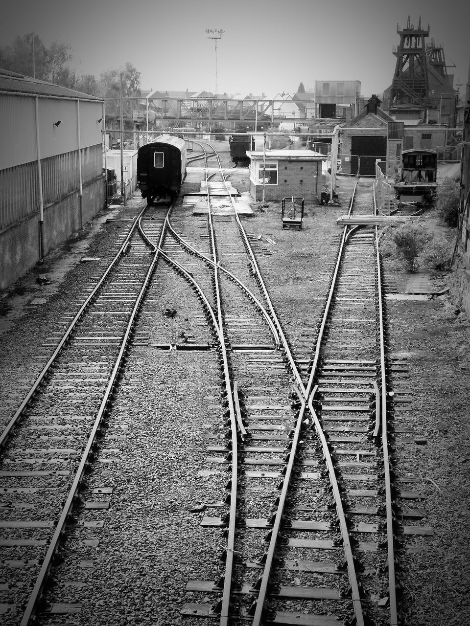 RAILROAD TRACKS AGAINST SKY