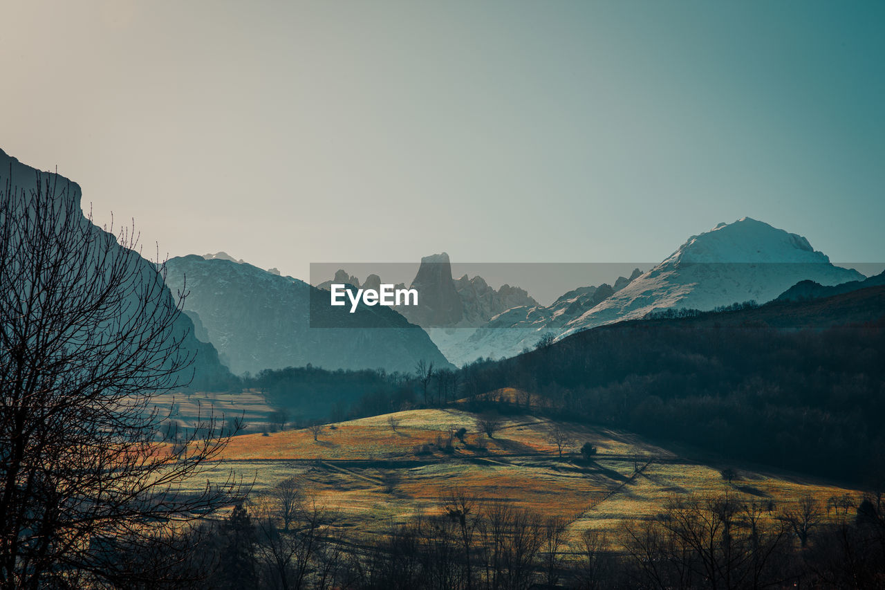 Scenic view of mountains against clear sky