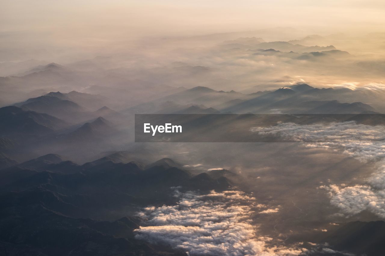 Aerial view of landscape during sunrise