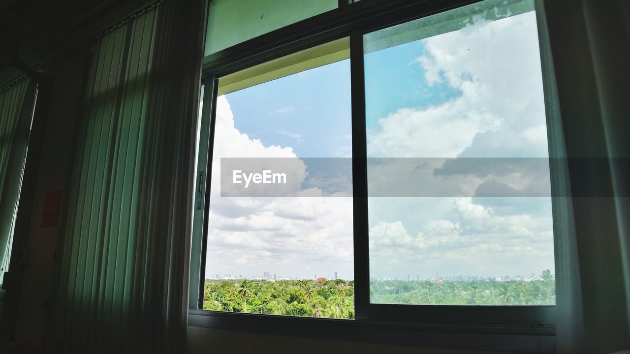 VIEW OF SKY SEEN THROUGH WINDOW