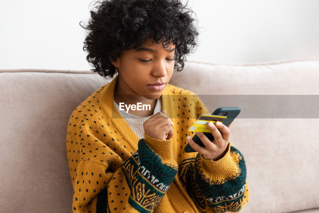 young woman using mobile phone