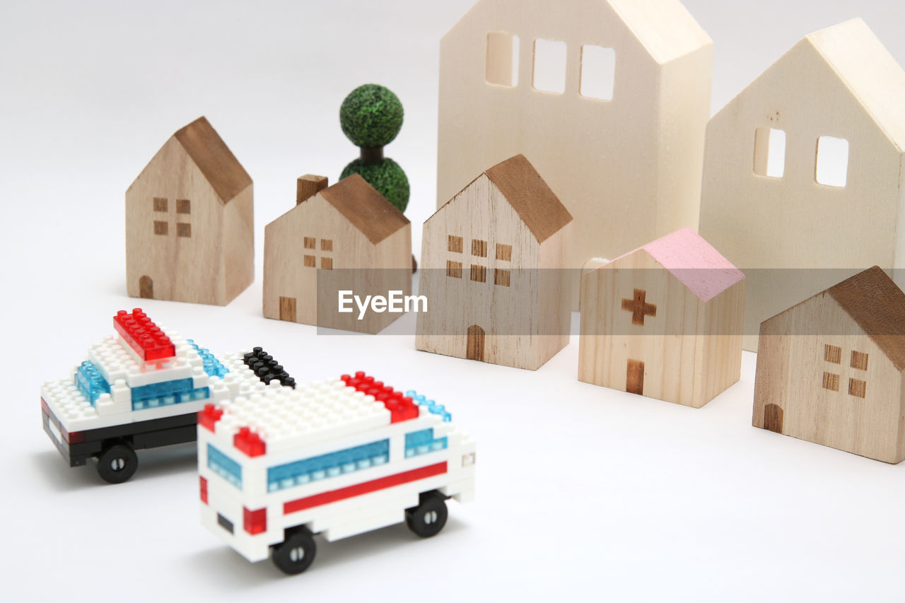 TOY CAR AGAINST WHITE HOUSE