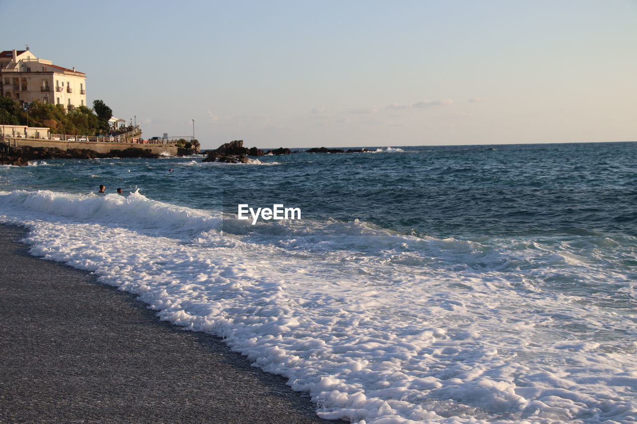 scenic view of sea against clear sky at night