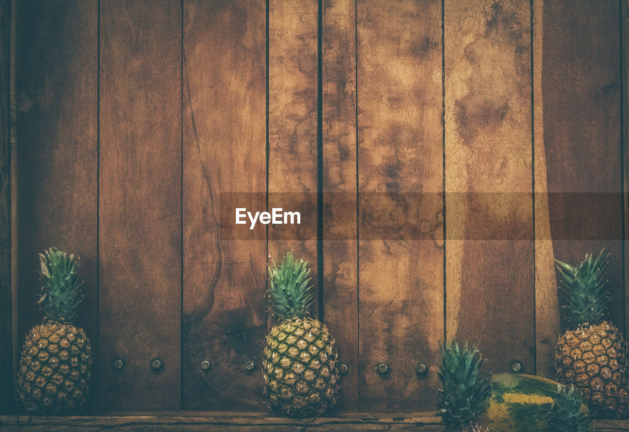 Close-up of fruits on wooden table