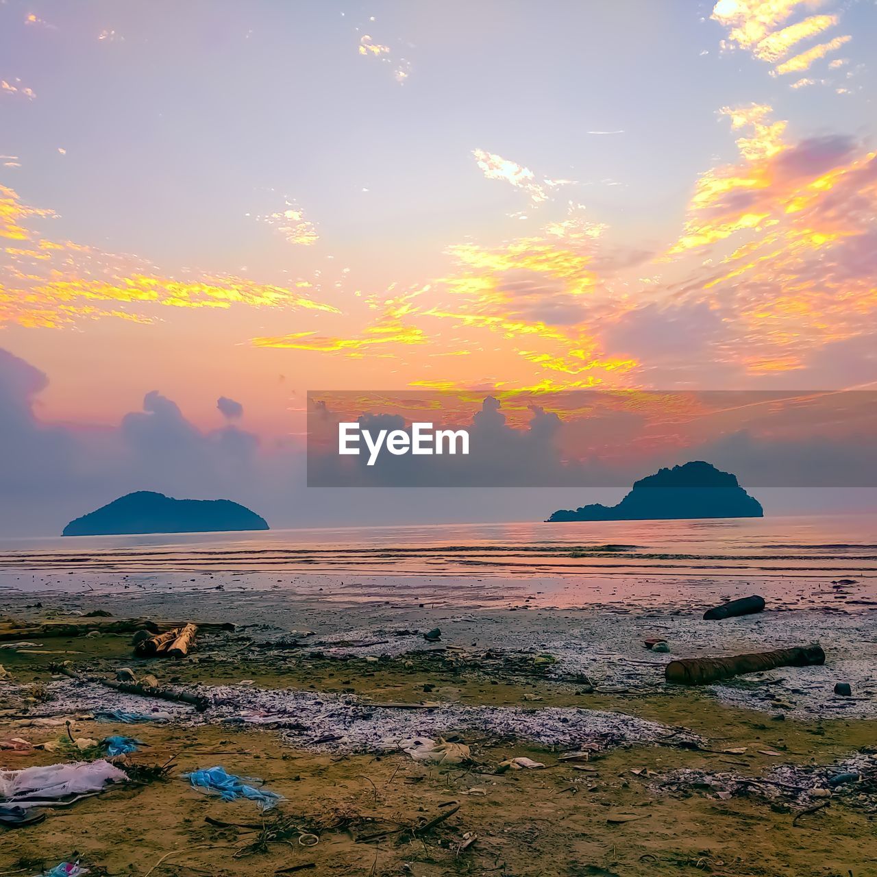 Scenic view of sea against sky during sunset