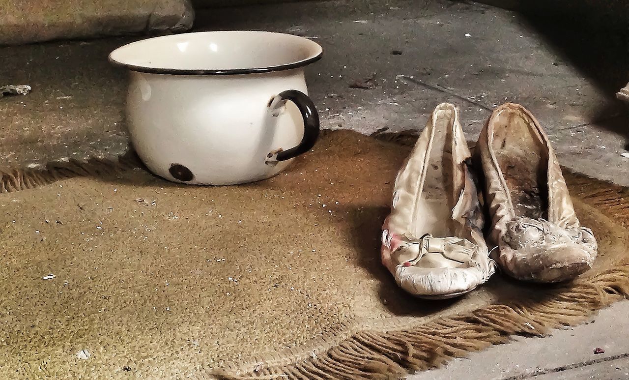 High angle view of shoes on table. abandoned places 