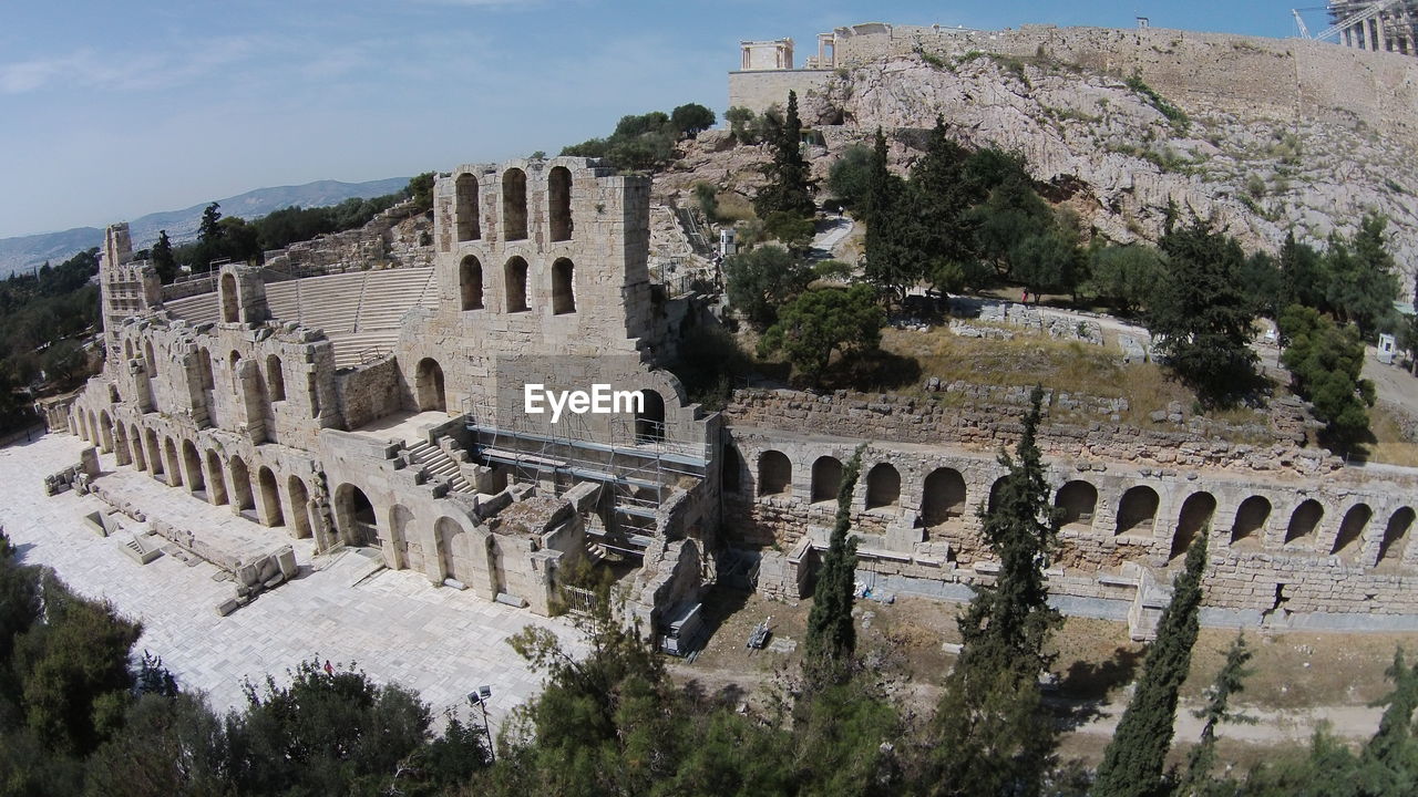 Abandoned amphitheater against blue sky