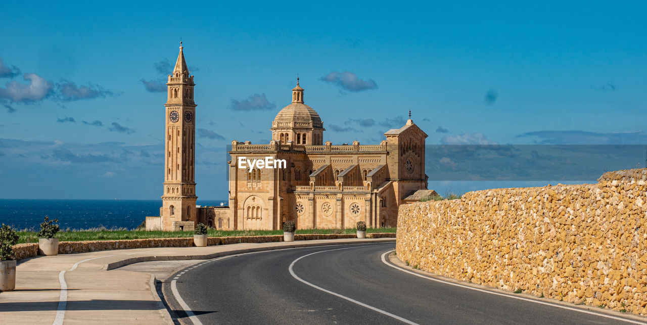 VIEW OF BUILDING BY SEA