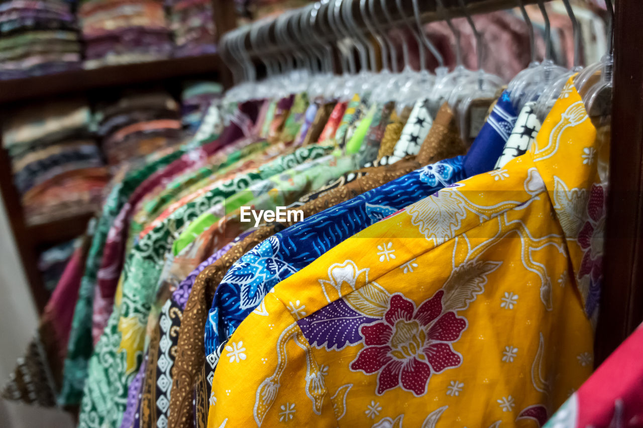 CLOSE-UP OF CLOTHES FOR SALE IN MARKET