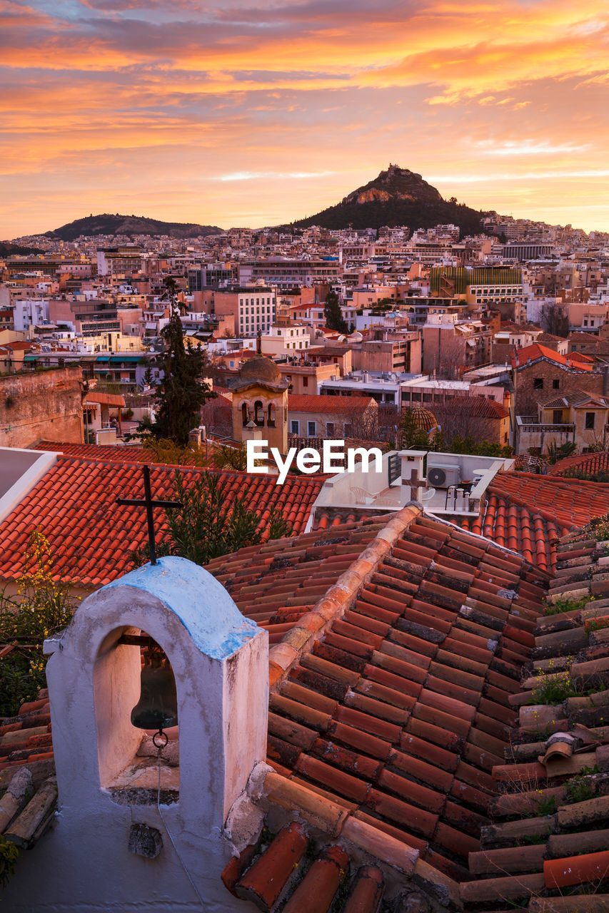 View of lycabettus hill from anafiotika neighborhood in the old town.