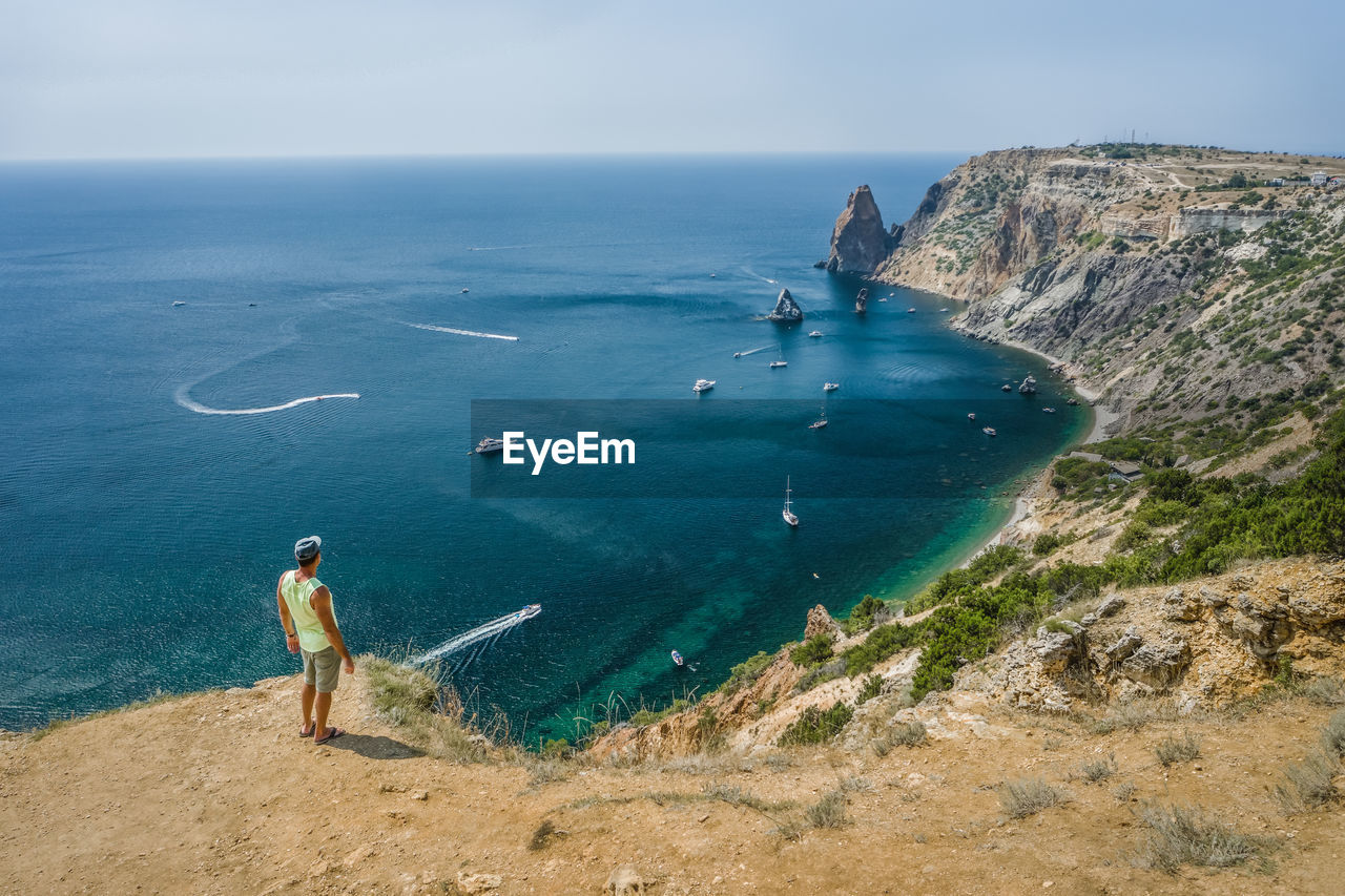 High angle view of people on beach against sky