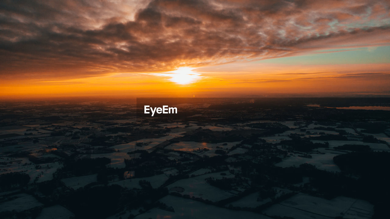 AERIAL VIEW OF SUNSET OVER LANDSCAPE