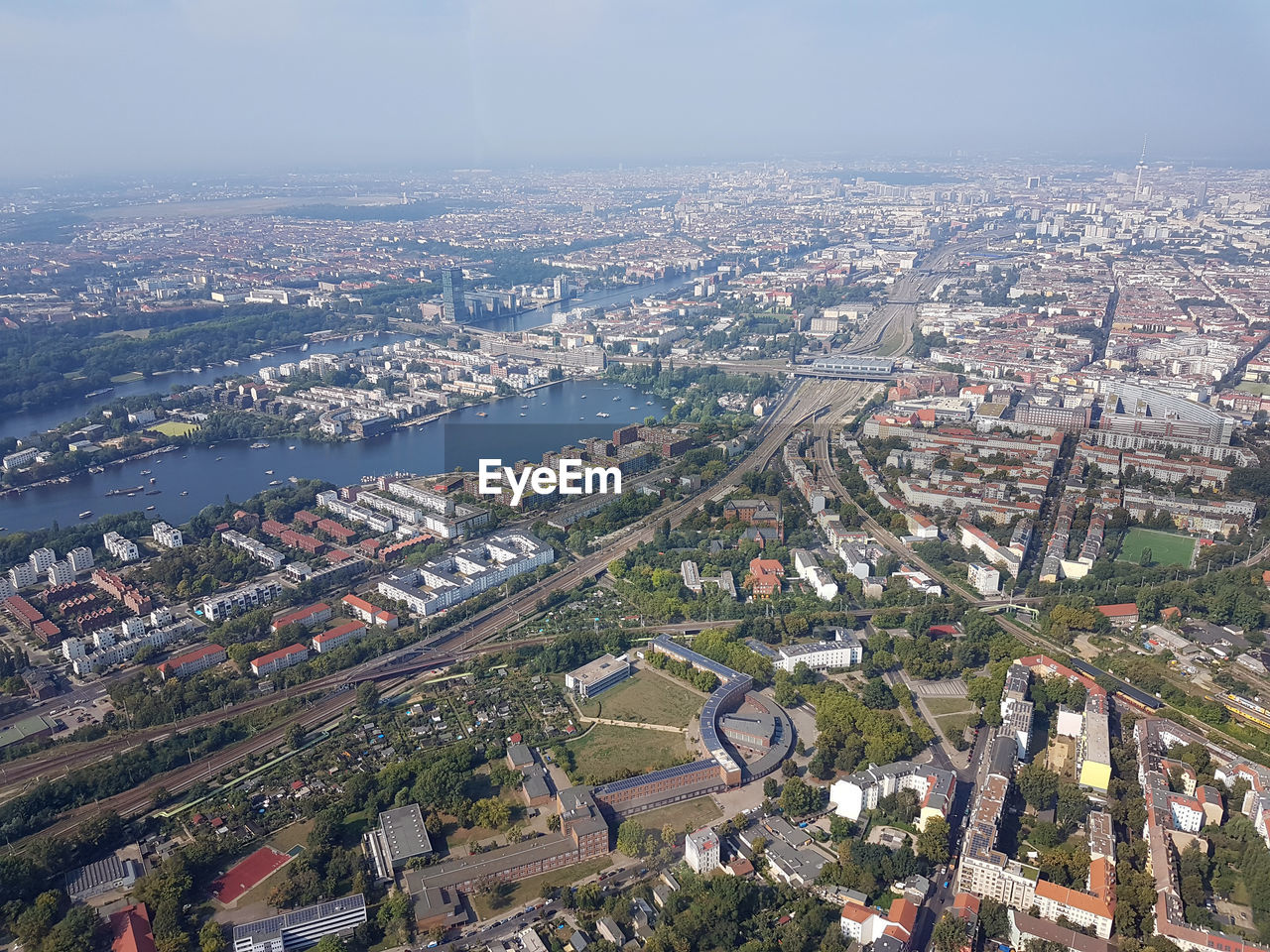 HIGH ANGLE VIEW OF CITY BUILDINGS AGAINST SKY