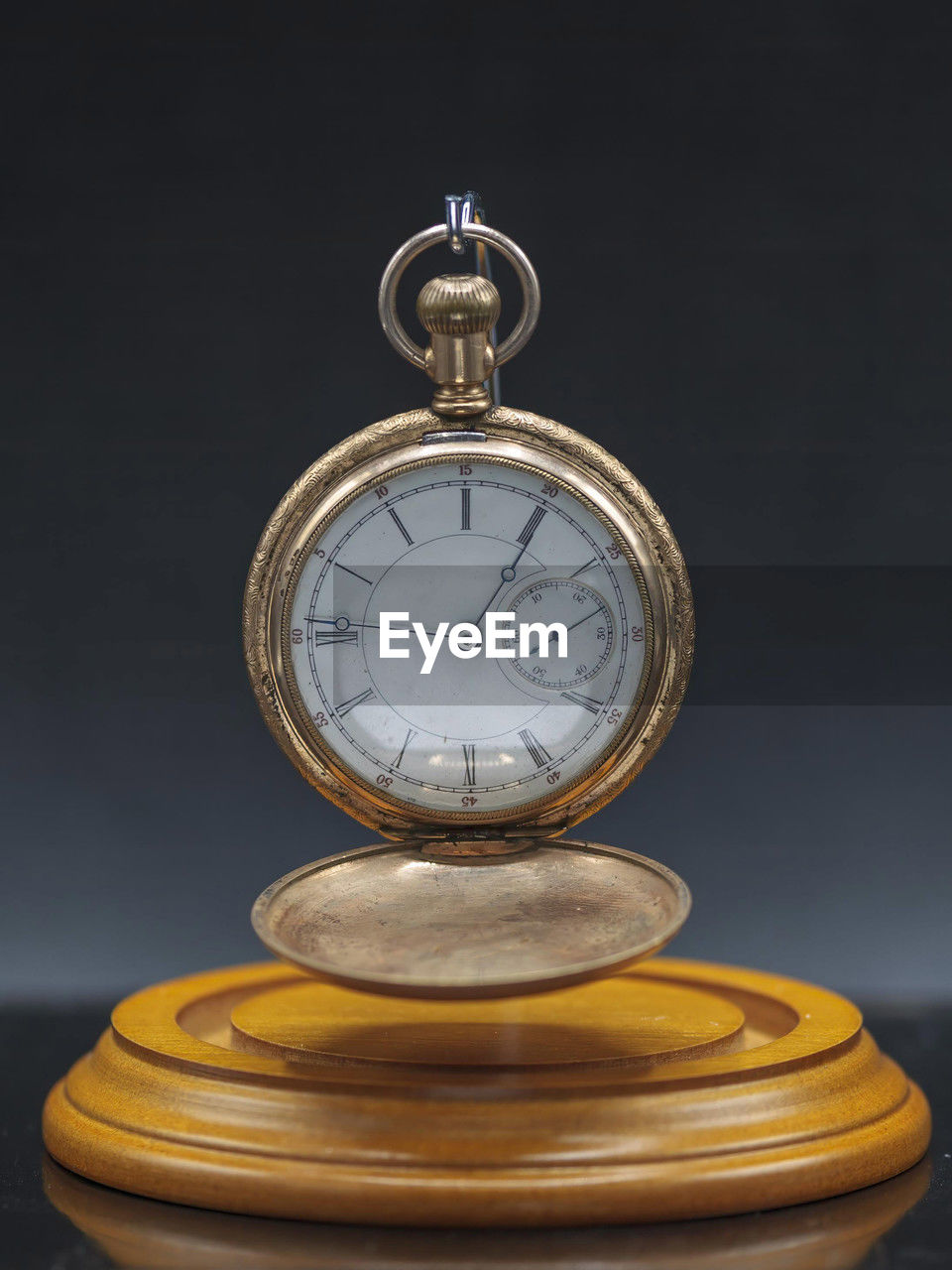 clock, time, studio shot, watch, no people, indoors, yellow, pocket watch, instrument of time, clock face, metal, gold, accuracy, number, retro styled, close-up, single object, black background