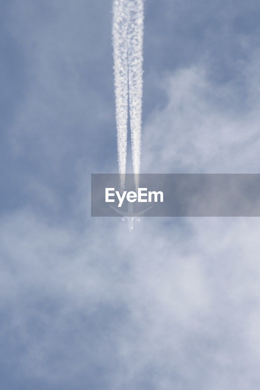 cloud, vapor trail, air vehicle, airplane, sky, flying, transportation, air show, mode of transportation, low angle view, on the move, smoke, motion, no people, blue, nature, day, mid-air, speed, plane, wing, fighter plane, vehicle, outdoors, white, travel