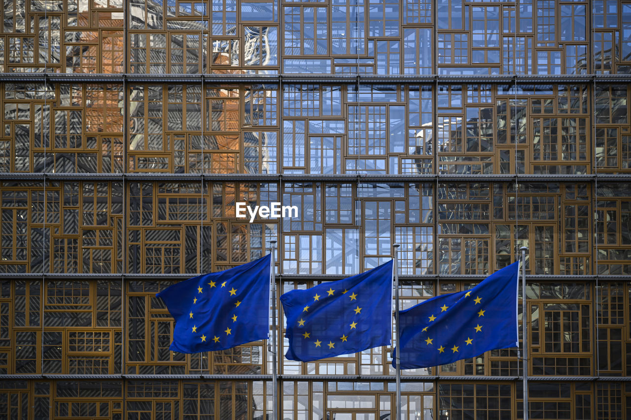 Low angle view of european flags in brussels