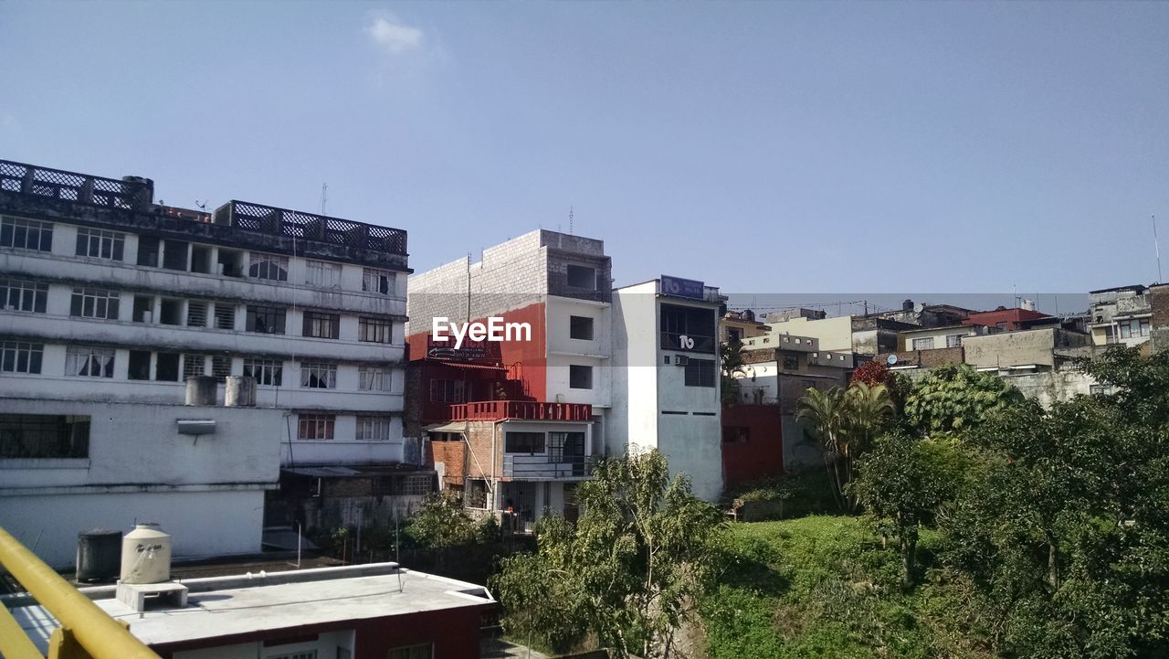 BUILDINGS AGAINST SKY