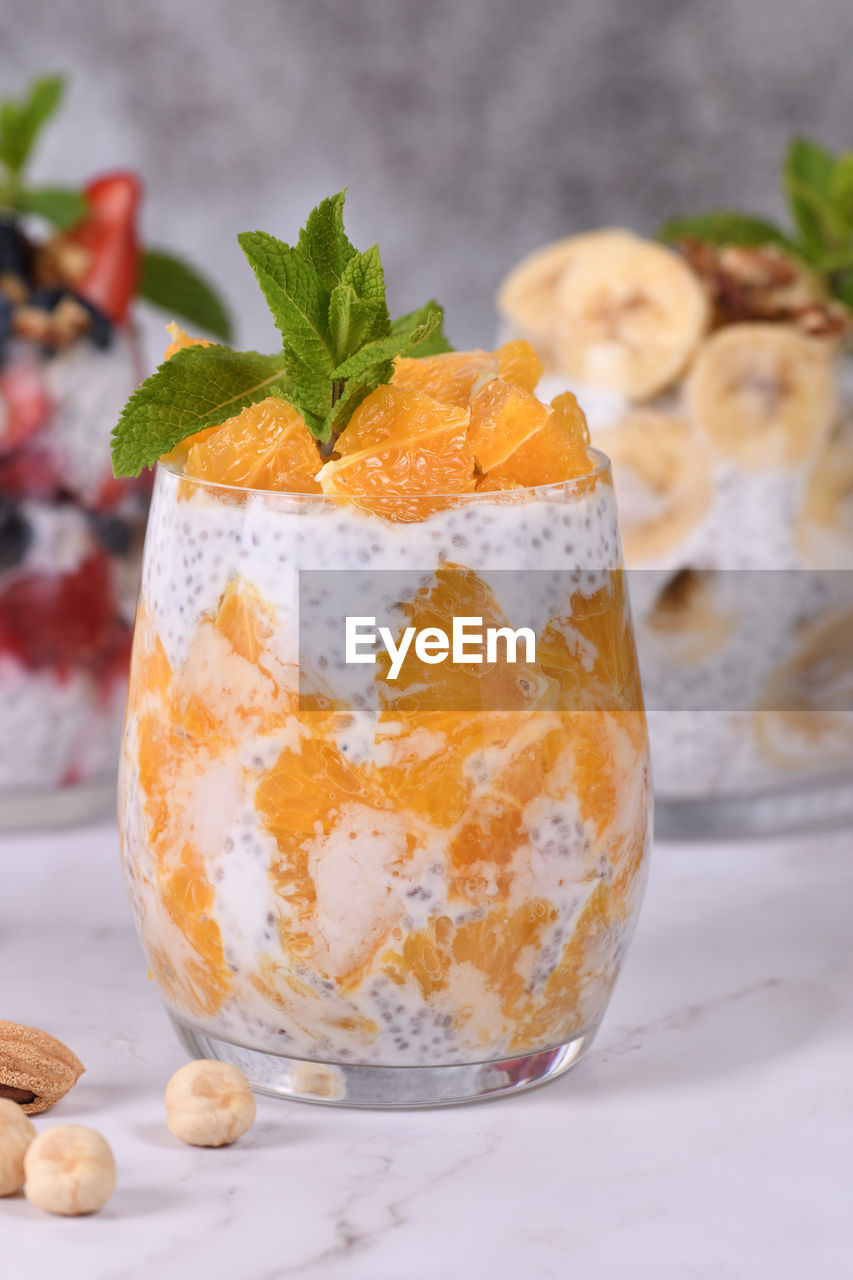 Chia dessert with greek yogurt and orange slices. absolutely helpful. perfect breakfast or snack. 