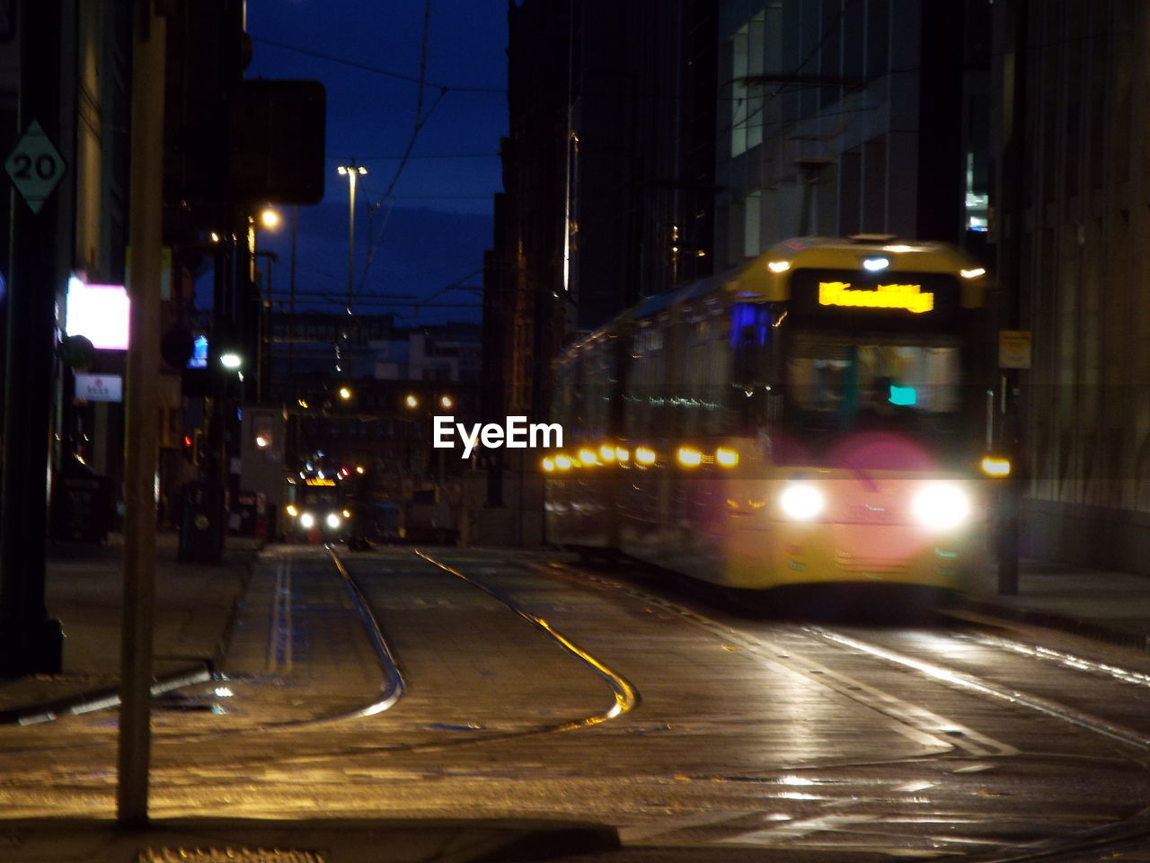 ILLUMINATED STREET AT NIGHT