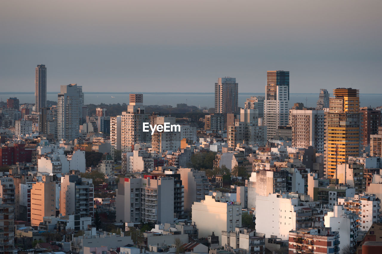 CITY BUILDINGS AGAINST SKY