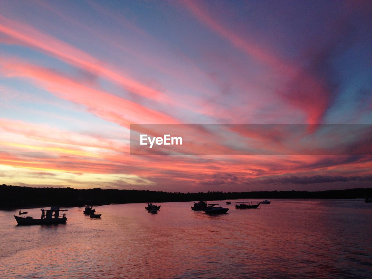 SCENIC VIEW OF SEA AGAINST ORANGE SKY