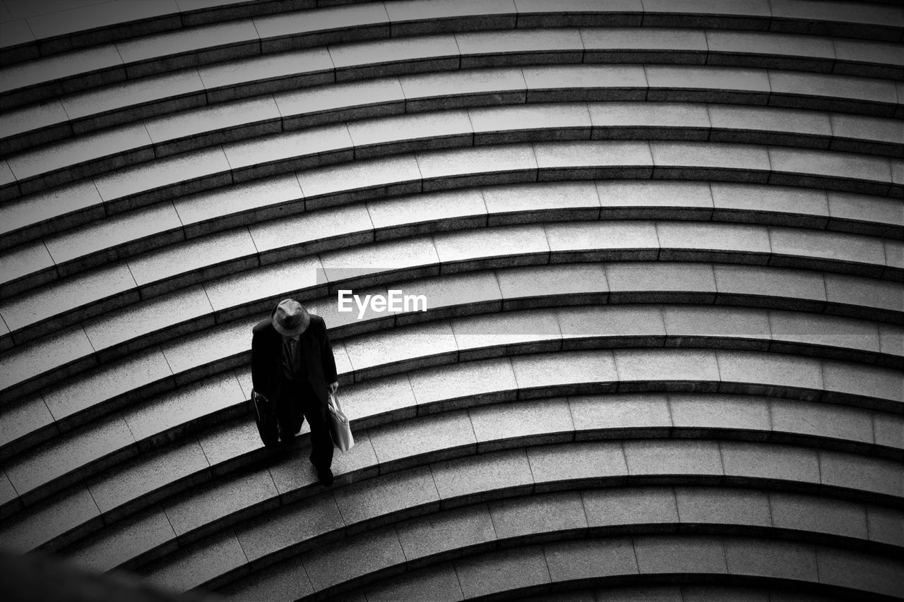 Man walking on staircase