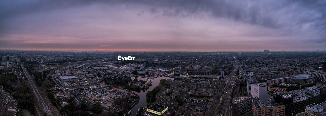 Aerial view of city at sunset