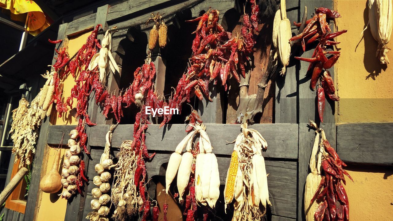 Close-up of vegetables hanging on market stall
