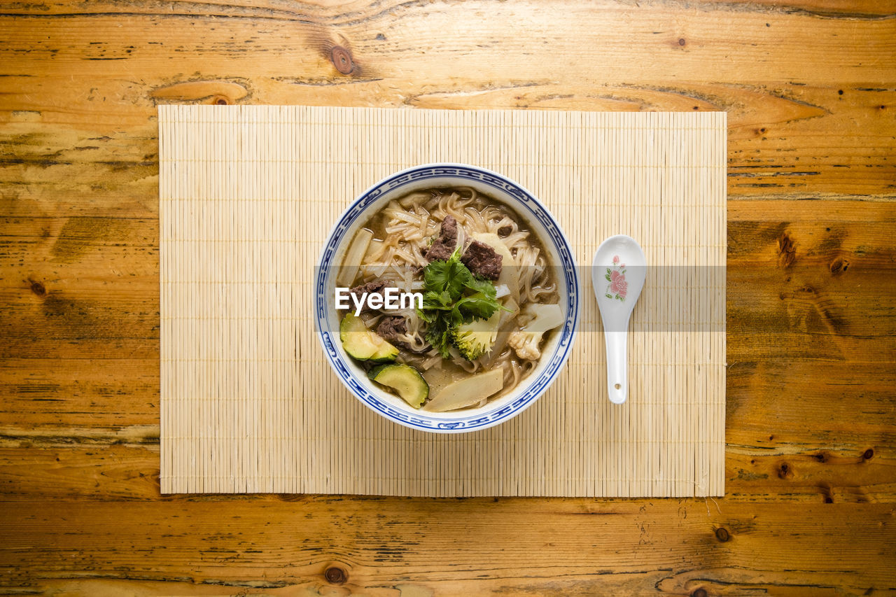 Directly above shot of soup served on table