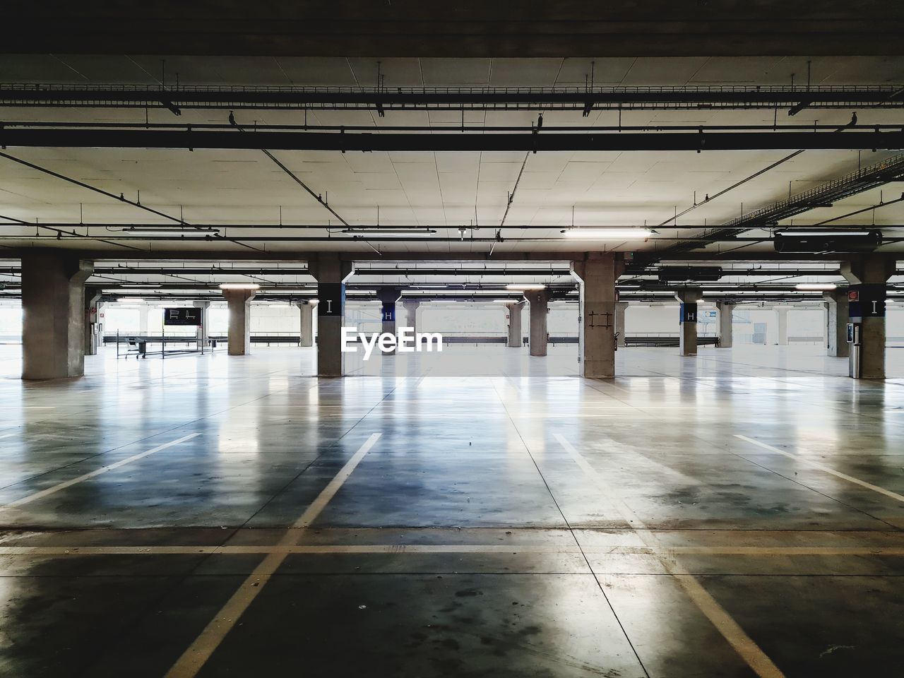 Empty and illuminated underground parking