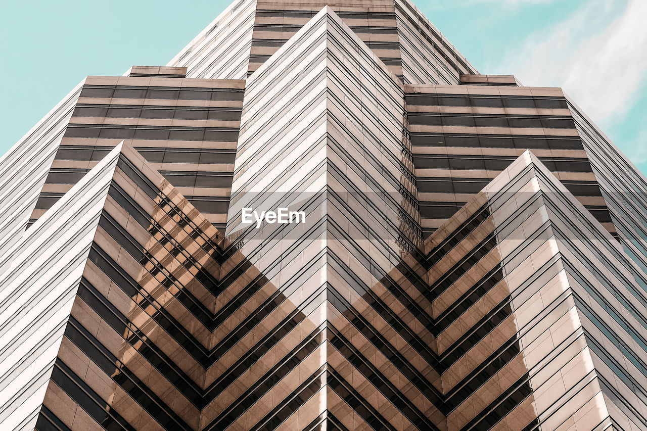 Low angle view of modern building against sky