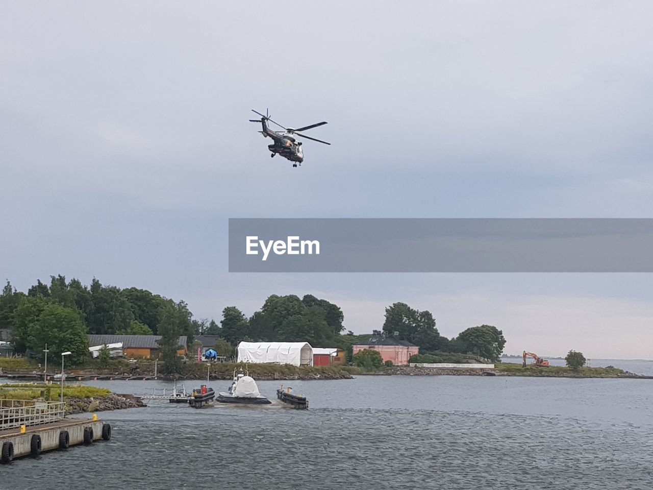 AIRPLANE FLYING ABOVE RIVER