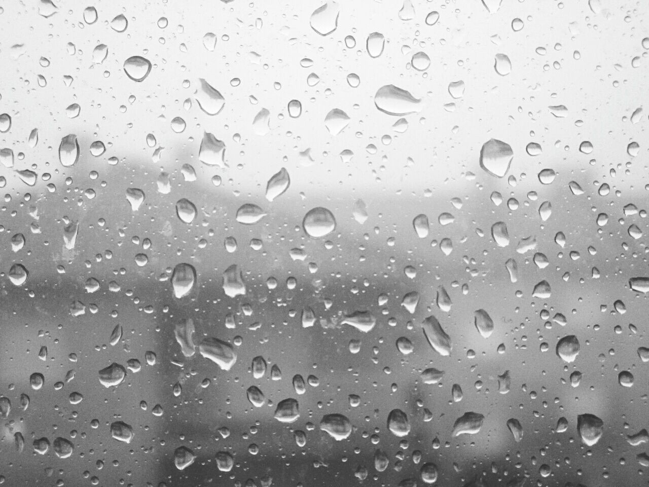 FULL FRAME SHOT OF WET WINDOW IN RAINY SEASON