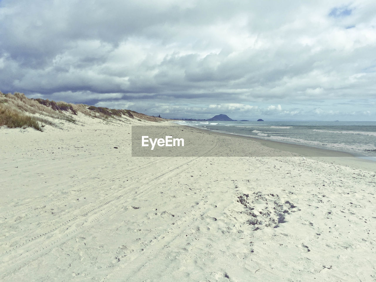 Scenic view of beach against sky