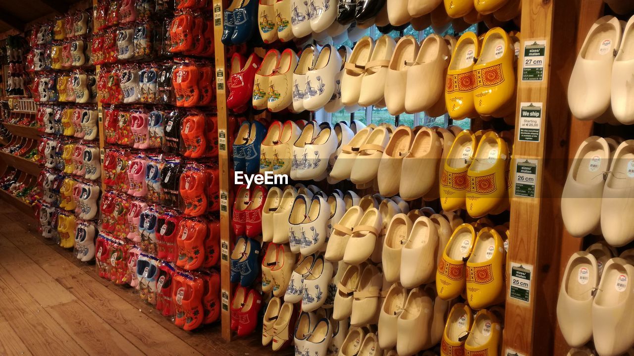 Various shoes hanging in store